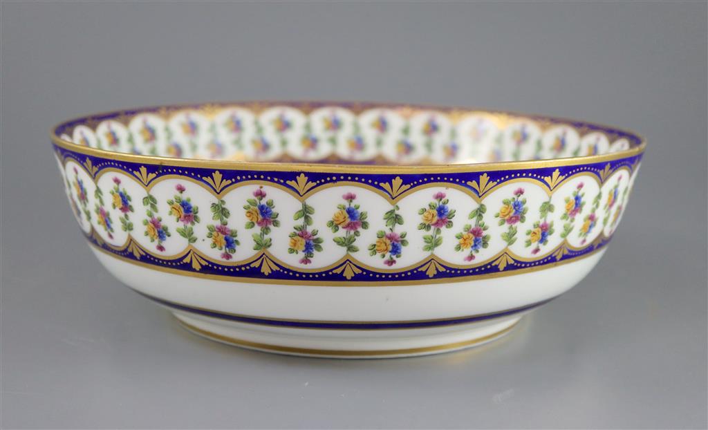 A Sevres hard paste porcelain salad bowl, c.1792, painted by Guillaume Noel (1755-1804) 25.3cm diameter